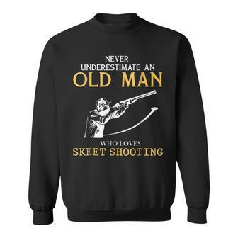 Never Underestimate An Old Man Who Loves Skeet Shooting Sweatshirt - Seseable
