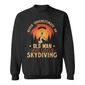 Never Underestimate An Old Man Who Loves Skydiving Gift For Mens Old Man Funny Gifts Sweatshirt | Mazezy