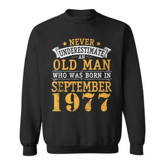 Never Underestimate An Old Man Who Was Born September 1977 Old Man Funny Gifts Sweatshirt | Mazezy