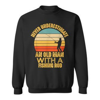 Never Underestimate An Old Man With A Fishing Rod Funny Gift Old Man Funny Gifts Sweatshirt | Mazezy DE