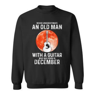 Never Underestimate An Old Man With A Guitar December Sweatshirt - Seseable