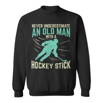 Never Underestimate An Old Man With A Hockey Stick Gift For Mens Sweatshirt - Seseable