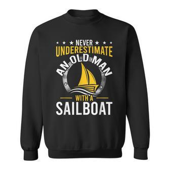 Never Underestimate An Old Man With A Sailboat Gift Old Man Funny Gifts Sweatshirt | Mazezy