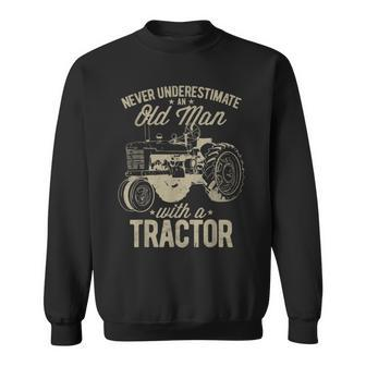 Never Underestimate An Old Man With A Tractor Lovers Farming Sweatshirt - Seseable