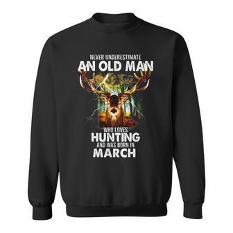 Never Underestimate An Old March Man Who Loves Hunting Sweatshirt - Seseable