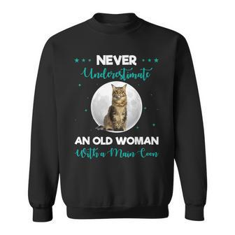 Never Underestimate An Old Woman Maine Coon Funny Cute Old Woman Funny Gifts Sweatshirt | Mazezy