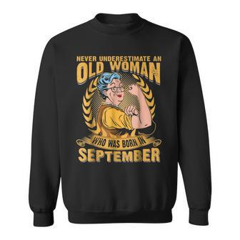 Never Underestimate An Old Woman Who Was Born In September Sweatshirt - Seseable