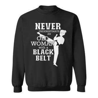 Never Underestimate An Old Woman With A Black Belt Taekwondo Old Woman Funny Gifts Sweatshirt | Mazezy