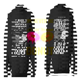 Never Underestimate An Old Woman With A Donut Old Woman Funny Gifts Sweatshirt | Mazezy