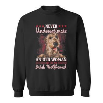 Never Underestimate An Old Woman With A Irish Wolfhound Old Woman Funny Gifts Sweatshirt | Mazezy