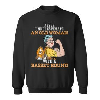 Never Underestimate An Old Woman With Basset Hound Old Woman Funny Gifts Sweatshirt | Mazezy
