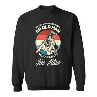 Never Underestimate And Old Man Who Can Do Jiu Jitsu Sweatshirt - Seseable