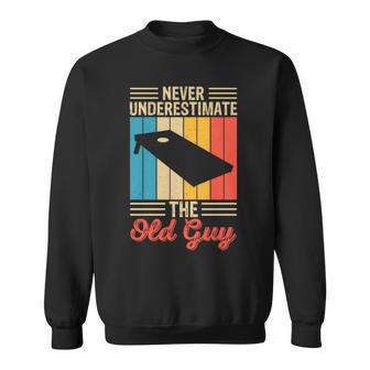 Never Underestimate The Old Guy Funny Cornhole Player Mens Sweatshirt - Seseable