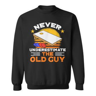Never Underestimate The Old Guy I Funny Cornhole Gift For Mens Sweatshirt | Mazezy