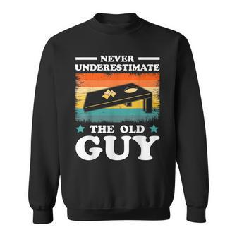 Never Underestimate The Old Guy Sack Toss Cornhole Sweatshirt | Mazezy