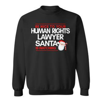 Be Nice To Human Rights Litigation Lawyer Santa Is Watching Sweatshirt | Mazezy