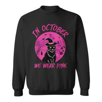In October We Wear Pink Black Cat Halloween Breast Cancer Sweatshirt - Monsterry