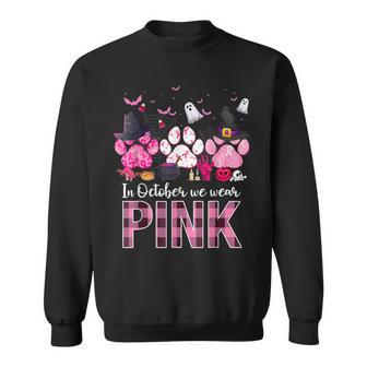 In October We Wear Pink Breast Cancer Halloween Dog Paws Sweatshirt - Seseable