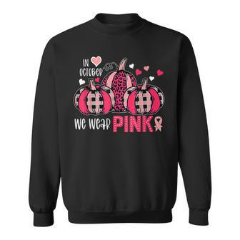 In October We Wear Pink Cute Pumpkin Breast Cancer Halloween Sweatshirt - Seseable