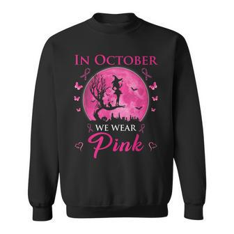 In October We Wear Pink Halloween Witch Breast Cancer Sweatshirt - Seseable