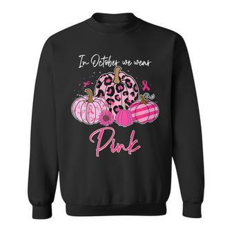 In October We Wear Pink Pumpkins Breast Cancer Halloween Sweatshirt - Monsterry AU