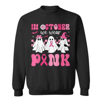 In October We Wear Pink Ribbon Ghost Halloween Breast Cancer Sweatshirt | Mazezy