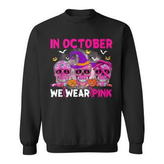 In October We Wear Pink Ribbon Halloween Breast Cancer Sweatshirt | Mazezy
