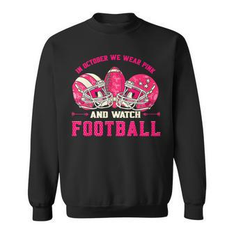 In October We Wear Pink And Watch Football Breast Cancer Sweatshirt - Seseable