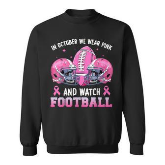In October We Wear Pink And Watch Football Breast Cancer Sweatshirt - Seseable