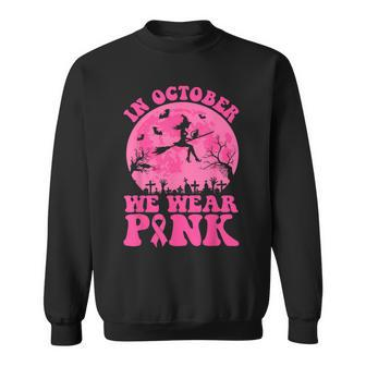 In October We Wear Pink Witch Halloween Breast Cancer Ribbon Sweatshirt - Monsterry
