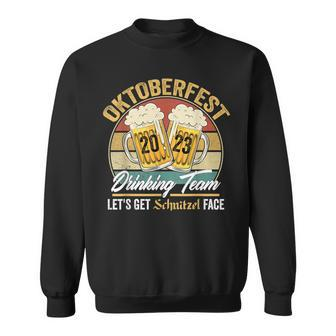 Oktoberfest 2023 Drinking Team Let's Get Schnitzel Face Sweatshirt - Thegiftio UK