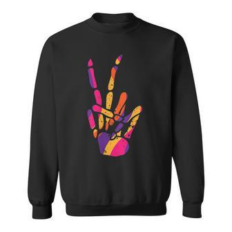 Pocket Skeleton Hand Peace Sign Scary Cool Halloween Hippie Halloween Sweatshirt | Mazezy