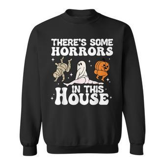 Theres Some Horrors In This House Ghost Pumpkin Halloween Sweatshirt - Seseable