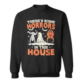 There's Some Horrors In This House Pumpkin Ghost Halloween Sweatshirt - Seseable