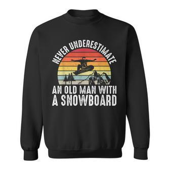 Snowboarding Never Underestimate An Old Man With A Snowboard Old Man Funny Gifts Sweatshirt | Mazezy