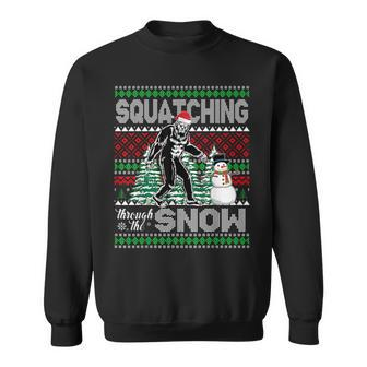 Squatching Through The Snow Bigfoot Ugly Sweater Christmas Sweatshirt | Mazezy