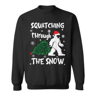 Squatching Through The Snow Christmas Sasquatch Santa Hat Sweatshirt - Thegiftio UK