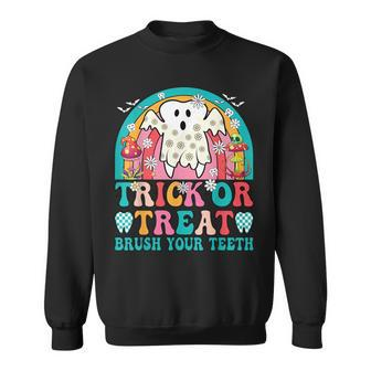 Trick Or Treat Brush Your Th Boo Ghost Halloween Dentist Sweatshirt | Mazezy