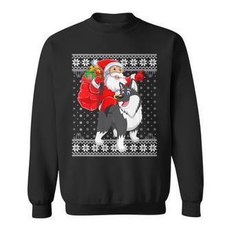 Ugly Xmas Sweater Style Santa Riding Malamute Dog Christmas Sweatshirt | Mazezy