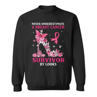 Never Underestimate A Breast Cancer Survivor By Looks Sweatshirt | Mazezy