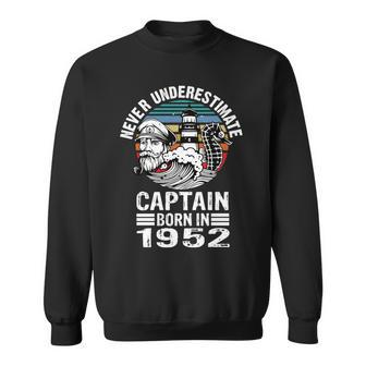 Never Underestimate Captain Born In 1952 Captain Sailing Sweatshirt - Seseable