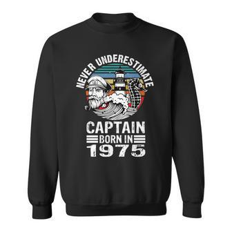 Never Underestimate Captain Born In 1975 Captain Sailing Sweatshirt | Mazezy
