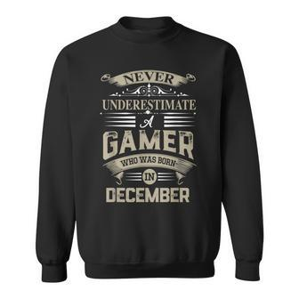 Never Underestimate A Gamer Who Was Born In December Sweatshirt - Seseable