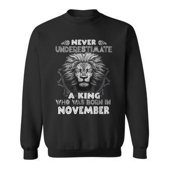 Never Underestimate A King Who Was Born In November Sweatshirt - Seseable
