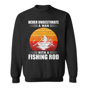 Never Underestimate A Man With A Fishing Rod Fishing Sweatshirt - Seseable