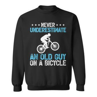 Never Underestimate An Old Guy On A Bicycle Cycling Biker Sweatshirt - Seseable