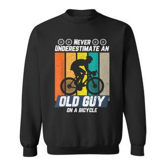 Never Underestimate An Old Guy On Bicycle Cycling Retirement Sweatshirt | Mazezy