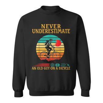 Never Underestimate An Old Guy On A Bicycle Retro Vintage Sweatshirt | Mazezy