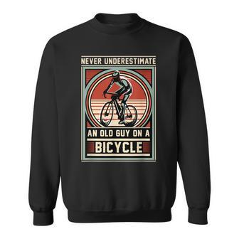 Never Underestimate An Old Guy On A Bicycle Vintage Style Sweatshirt - Seseable