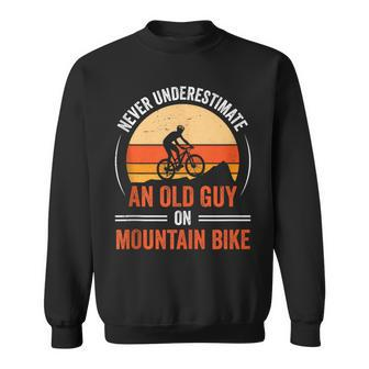 Never Underestimate An Old Guy On A Mountain Bike Biking Sweatshirt | Mazezy
